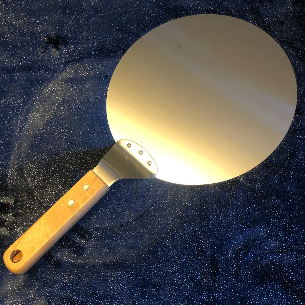 Pizza Server 10 inch circular never been used. - Picture 1 of 7